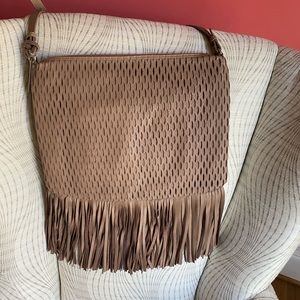 Vince Camuto laser cut fringe cross body